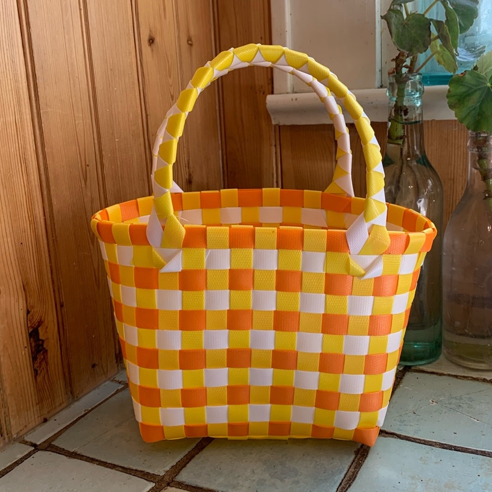New, unused woven mini basket tote
